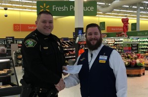 Photo of Sheriff Dale Schmidt with Store Manager Adam Zastrow