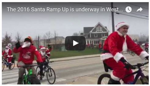VIDEO: Click HERE to see what 100 Santas riding bicycles looks like!