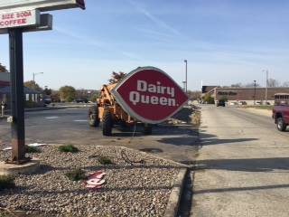 Dairy Queen sign being removed