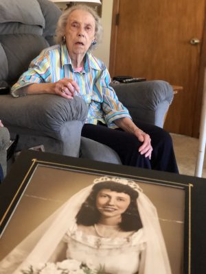 Margaret Bales sits in her living room sharing memories of her wedding day. 