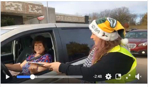 Handing out the We Energies Cookie Book in West Bend