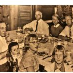 Family at dinner table at Timmer's Resort