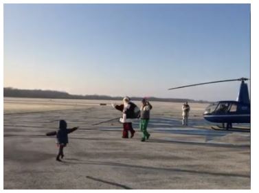 Santa arrives West Bend Airport