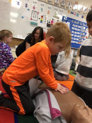 Chest compressions at Decorah Elementary