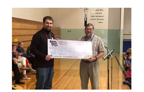 Corey Faust donates to Holy Angels