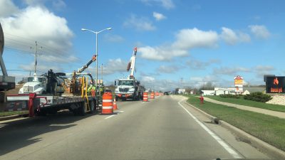 We Energies crews installing traffic signals 