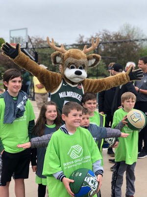 Bucks at ribbon cutting for basketball court