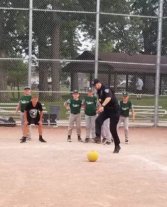 Kewaskum Police Officer “kicks it around” with local kids | by Kewaskum Police Department