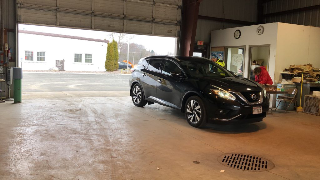 Vehicle in drive-thru voting in Town of West Bend