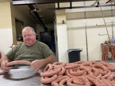 Tom Schwai, making brats