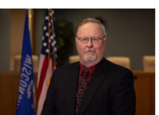 Funeral and police honors tonight, Monday, Nov. 30 for Steve E. Hoogester, 65, of West Bend