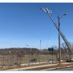 Removing light poles at Carl Kuss