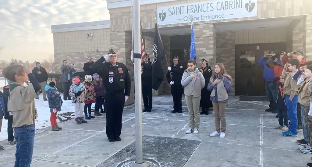 Cabrini, flag, scouts, salute