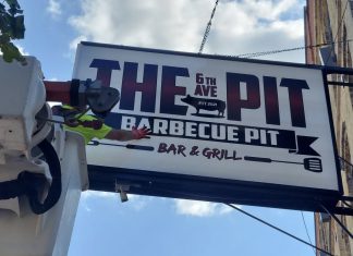 REAL ESTATE | Second time is the charm for sign installation at 6th Ave BBQ Pit
