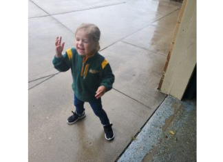 St. Peter Catholic School families hit the splash pad in the rain
