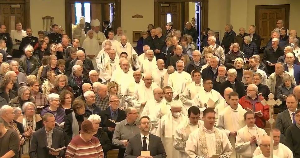 Entrance to the funeral for Rev. Jerome Repenshek