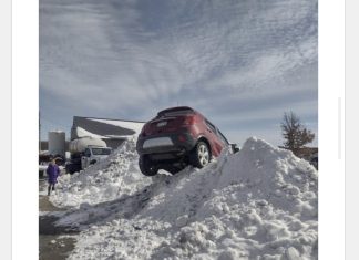 VIDEO | Car climbs 6-foot snowbank to avoid crash on Hwy P