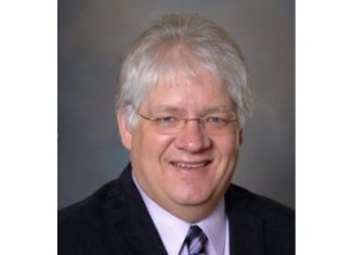 Memorial service today, February 25 for Dr. Brian D. Nelson, 58, of West Bend, WI