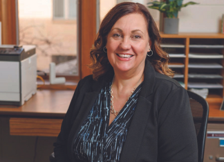 Lori Stedl celebrated by teammates for commitment, service | By Carrie Sturn