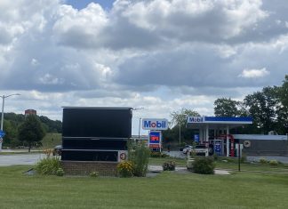 VIDEO | Sobering images as UW-Washington County signage removed- End of an era