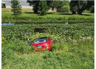 Car crosses Hwy 60 in Hartford, WI and ends up in river at Willowbrook Park