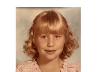 Remembering photo day at school – Can you identify this young grocer?