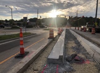 New traffic pattern on Decorah Road with entrance/exit to Decorah Shopping Center