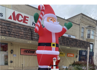 Tennies Hardware adds 20-foot Santa to front of store in West Bend, WI
