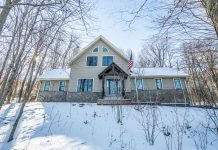 REAL ESTATE | Escape to the Woods: Lodge-style home tucked into West Bend’s snowy landscape | By Emmer Real Estate Group
