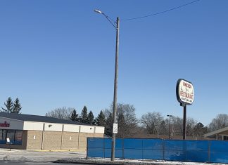 REAL ESTATE | Fencing off Omicron prior to razing & VisionWorks still open