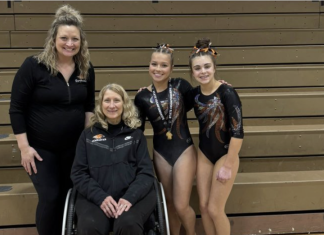 Mackenzie Gruszynski of HUHS scores triple gold at WIAA Gymnastics Individual State Championship | Photo courtesy Hartford Gymnastics