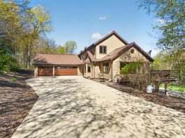REAL ESTATE | Custom country home on 11 wooded acres in Allenton, WI | By Emmer Real Estate Group