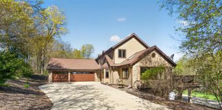 REAL ESTATE | Custom country home on 11 wooded acres in Allenton, WI | By Emmer Real Estate Group