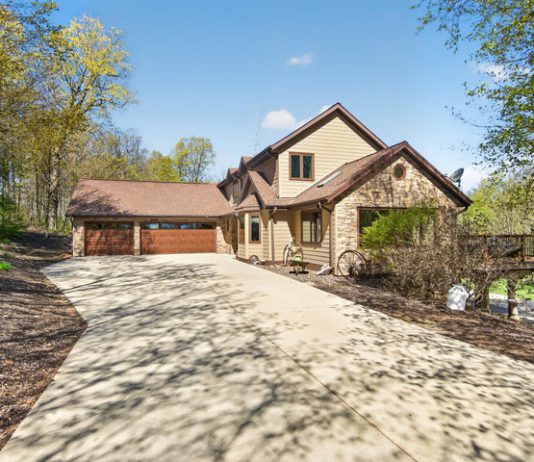 REAL ESTATE | Custom country home on 11 wooded acres in Allenton, WI | By Emmer Real Estate Group