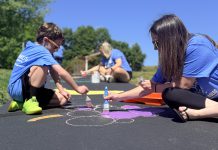 Volunteers give new life to Born Learning Trail during United Way Day of Action