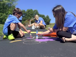Volunteers give new life to Born Learning Trail during United Way Day of Action