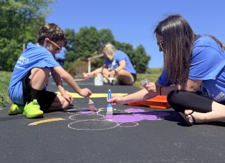 Volunteers give new life to Born Learning Trail during United Way Day of Action