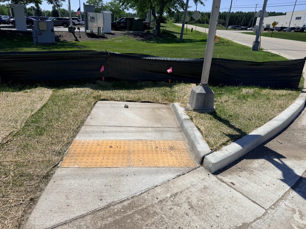 Curb & ramp construction nearly $8K a piece on Hwy 33 in West Bend, WI