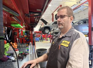 From salvage yards to lead tech at Auto Safety Center: Dean has nearly 40 years working on cars